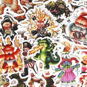 May include: A collection of colorful stickers featuring various cartoon characters, including a baby in a diaper, a devil, a pirate, and a monster. The stickers are all on a white background and have a whimsical, cartoonish style.