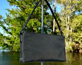 バッグ COACH signature Soft Clip porch Black COACH® | Swing Zip Bag 20