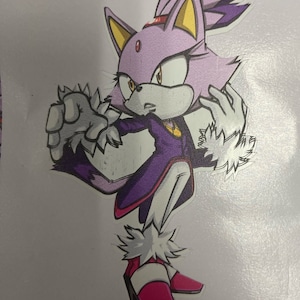 May include: A purple and white cartoon cat character with a yellow headband and red shoes. The character is in a fighting pose with its claws out.