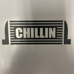 May include: Black and white sticker with the word "CHILLIN" in white letters on a black background. The sticker is shaped like a radiator with horizontal lines.