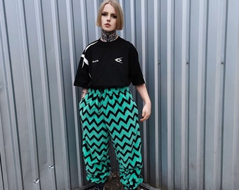 Festival stripe fleece joggers zebra pants handmade zigzag faux fur raver trousers premium party overalls in green black