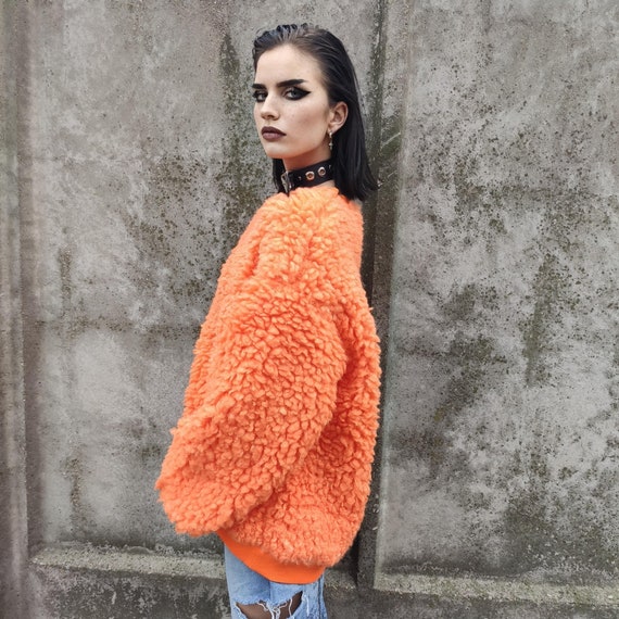 Jumper with faux fur sleeves top