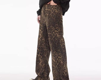 Jeans leopardati pantaloni unisex in denim con stampa animalier pantaloni ghepardo pantaloni tigrati pantaloni jogger svasati in marrone