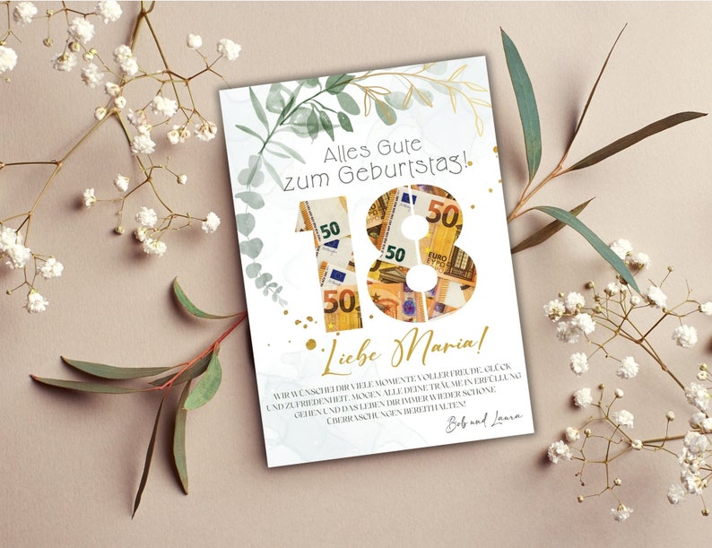 May include: A white card with a green and gold floral design. The number 18 is made of 50 euro bills. The text "Alles Gute zum Geburtstag!" and "Liebe Maria!" is written in gold. The card is signed "Bob and Laura".