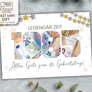 Puede incluir: Una tarjeta blanca con estrellas doradas y el texto "LEGENDÄR ZEIT 1985 Alles Gute zum 40. Geburtstag!" Los números 1985 están hechos de billetes de euro.
