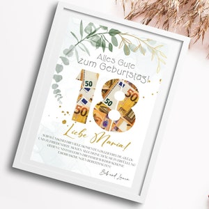 May include: A white framed print with a gold and green floral design. The number 18 is made of euro bills. The text "Alles Gute zum Geburtstag!" and "Liebe Maria!" is printed on the print.
