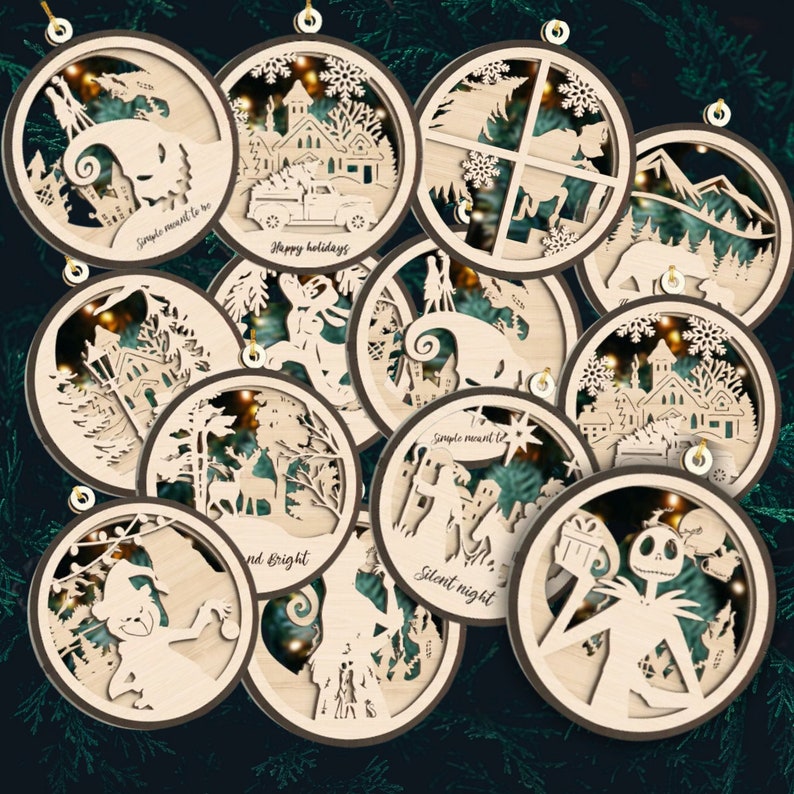May include: Twelve wooden Christmas ornaments with intricate cutouts and LED lights. The ornaments feature various holiday themes, including a snowman, a Christmas tree, a house, and a reindeer. The ornaments are decorated with the text "Simple meant to be", "Happy holidays", "Silent night", and "And bright".