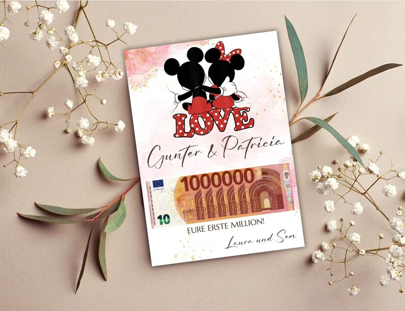 May include: A pink and gold card with a cartoon image of Mickey and Minnie Mouse. The card says "LOVE" in red letters with white polka dots. The text "Gunter & Patricia" is below the image. A 10 Euro bill is partially visible with the text "EURE ERSTE MILLION! Laura und Sam".