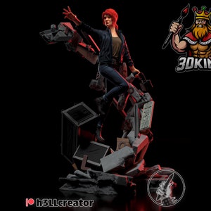 May include: A red-haired woman in a black leather jacket and blue jeans stands on a pile of broken concrete and electronics. She is holding a piece of broken metal in her right hand. The scene is set against a black background.