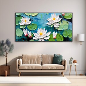 May include: A painting of white water lilies with green leaves on a blue background. The lilies are painted in a realistic style with thick brushstrokes.