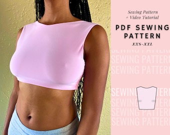 May include: A pink sleeveless crop top sewing pattern with a white background. The pattern includes a video tutorial and is available in sizes XXS-XXL. The text "PDF SEWING PATTERN" is written in large, bold letters.