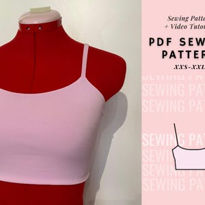 May include: A pink crop top sewing pattern with a digital illustration of the finished garment. The pattern includes sizes XXS-XXL and comes with a video tutorial.  PDF Sewing Pattern.