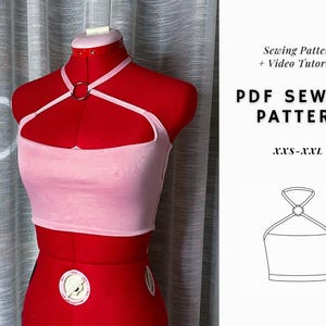 May include: A pink halter top with a silver ring detail. The top is on a red dress form. The image also includes a line drawing of the top with the text "PDF Sewing Pattern" and "XXS-XXL".