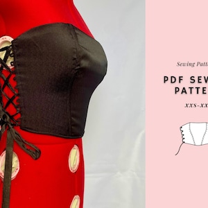 May include: A black corset top with a lace-up front is displayed on a red dress form. The top is made of a shiny fabric and has a bow at the waist. The image also includes text that reads "PDF Sewing Pattern" and the size range XXS-XXL.