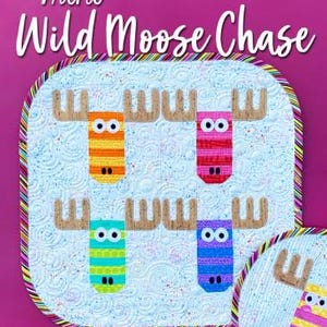 May include: Mini quilt featuring a white background with a colorful, whimsical design of four moose with antlers. The quilt has a multi-colored border. The text "Mini Wild Moose Chase" is at the top of the quilt.