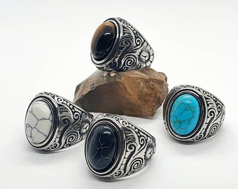 Signet ring in 316L stainless steel with a vintage look adorned with natural tiger's eye black agate stone