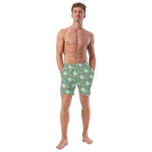 Groene premium zwembroek met contouren van Monstera, bloemen en andere tropische plantenpatroon Zwembroek voor heren.