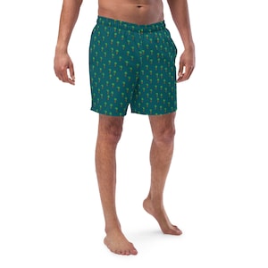 May include: Teal blue athletic shorts with a repeating pattern of green palm trees.