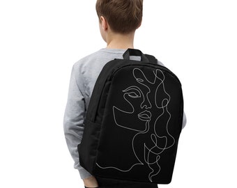 Mochila negra de lujo minimalista con un boceto abstracto lineal continuo de arte moderno de la cara de la mujer en blanco. Excelente seguridad y viaje.