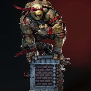 May include: A detailed figurine of a green, muscular turtle character with a red eye mask, crouching on a weathered brick chimney structure. The character holds a sharp metal sai weapon in one hand, featuring textured skin and red fabric wraps.