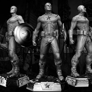 May include: Black and white statues of Captain America in a dynamic pose, holding his shield. The statues are on detailed bases, with the Avengers Assemble logo in the top left corner. The background is a cityscape.