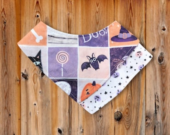 Peut inclure: Un bavoir sur le thème d'Halloween avec un motif patchwork. Le bavoir présente des carrés avec un chat noir, une sucette, une chauve-souris, une citrouille et un chapeau de sorcière. La bordure est blanche avec des étoiles noires et des jack-o'-lanternes.