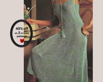 May include: A sleeveless, floor-length mint green knit dress with a scoop neckline and a matching long cord necklace featuring a tassel. A black circular graphic on the left displays the text 40% off on 2 or more patterns with a red heart icon.