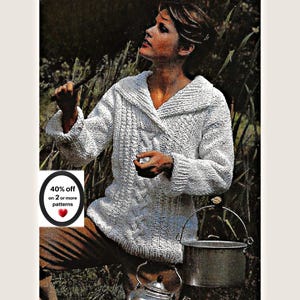 Peut inclure: Un pull en tricot blanc à manches longues avec un large col et des motifs de torsades verticaux. Le pull présente une surface texturée et des manches à revers. Un graphique circulaire à gauche affiche le texte 40% off on 2 or more patterns.