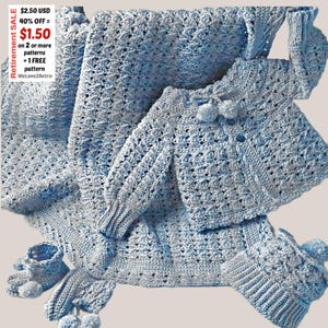 May include: A light blue crochet baby set, comprising a blanket, jacket, hat, booties, and mittens. The set has a textured stitch pattern and pom-pom accents. The image includes the text "Retirement SALE".