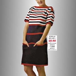 May include: A vintage knitted dress with a striped bodice in red, white, and black. The dress has a navy blue skirt with red trim and pockets. The image text says "£0.72".