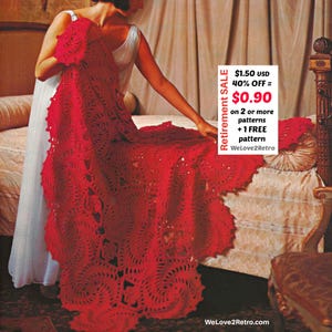 May include: A woman holds a large, vibrant red crocheted blanket with a scalloped edge. The blanket features a repeating spiral design. The image includes text that reads "Retirement SALE" and "WeLove2Retro".