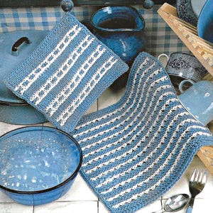 May include: Two square, hand-knitted potholders featuring a blue and white striped pattern. One potholder displays a wider, block-style stripe design, while the other features a thinner, repeating horizontal stripe pattern in the same blue and white colors.