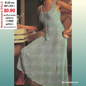 May include: A pale green, sleeveless maxi dress with a textured knit design. The dress features a scoop neckline and a flowing skirt. A long necklace with a tassel is visible. The image includes the text "Retirement SALE" and "WeLove2Retro".