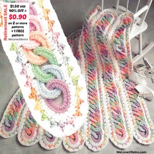 May include: A colorful, crocheted scarf with a chain link design. The scarf features a scalloped edge and is made with pastel colors including pink, blue, green, and orange. The text "Retirement SALE" is visible.