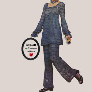 May include: A dark blue crochet two-piece set consisting of a long-sleeved tunic with a scoop neckline and flared sleeves, paired with matching wide-leg trousers. A black oval frame displays the text 40% off on 2 or more patterns with a red heart.