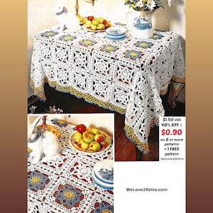 May include: A white crocheted tablecloth with a square pattern, trimmed with yellow and blue edging, covers a table. A plate of apples, a ceramic rabbit, and a blue and white vase with flowers are on the table. The text "WeLove2Retro.com" is visible.