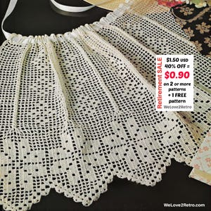 May include: Cream-colored, open-weave crochet pattern with a scalloped edge. The textile has a grid-like design and is gathered at the top with a white ribbon. Text on the right side reads "Retirement SALE" and "$0.90".