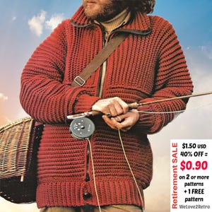 Könnte beinhalten: Ein roter Strickpullover mit Reißverschluss und braunem Kragen. Eine Angelrute und ein Korb sind zu sehen. Das Bild hat eine Vintage-Ästhetik.