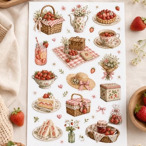 May include: A sheet of stickers featuring various strawberry-themed illustrations. Includes a basket of strawberries, a teapot with flowers, a tart, a teacup, a picnic basket, a hat, a cake slice, sandwiches, and a jar of jam.