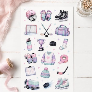 May include: A sheet of stickers featuring hockey-themed illustrations. Includes a pink helmet, skates, hockey sticks, a net, a trophy, a jersey with a heart, a beanie, and other accessories in pastel colors. The stickers are arranged on a white background.