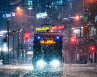 Toronto / Winter Cityscape / TTC Streetcar passing Sankofa Square