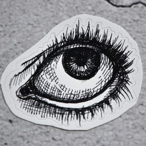 Adesivo de vinil com olhos assustadores: decoração gótica para laptop