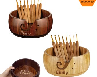 May include: Three wooden yarn bowls with personalized names, Alyssa, Emily, and Olivia. Each bowl has a hook for yarn and comes with a set of 10 crochet hooks. The bowls are made of natural wood and have a smooth finish. The crochet hooks are made of bamboo and have gold tips.