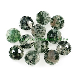 May include: A collection of 10 green moss agate cabochons, each with a unique pattern of green and white. The cabochons are faceted and have a smooth, polished finish.