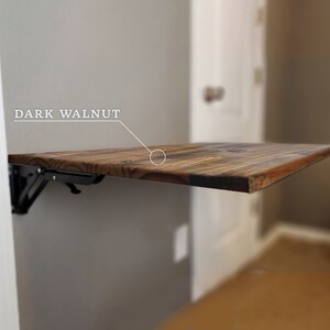 Wall mounted craft sale table