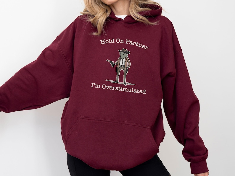 Hold On Partner Im Overstimulated Shirt, Cowboy Frog Sweatshirt, Unhinged Tshirt, Weirdcore Outfits, Gen Z Sweater, Funny Meme Hoodie Tee, Cowgirl Frog Women Sweatshirts, Western Frogs Girl Party Hoodies, Frog Gun Vacation Shirts,Holiday Cowgirls Tee