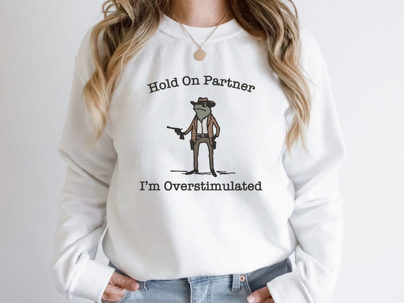 Hold On Partner Im Overstimulated Shirt, Cowboy Frog Sweatshirt, Unhinged Tshirt, Weirdcore Outfits, Gen Z Sweater, Funny Meme Hoodie Tee, Cowgirl Frog Women Sweatshirts, Western Frogs Girl Party Hoodies, Frog Gun Vacation Shirts,Holiday Cowgirls Tee