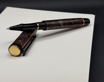 Swirling grain of Orange and blue dyed Maple burl