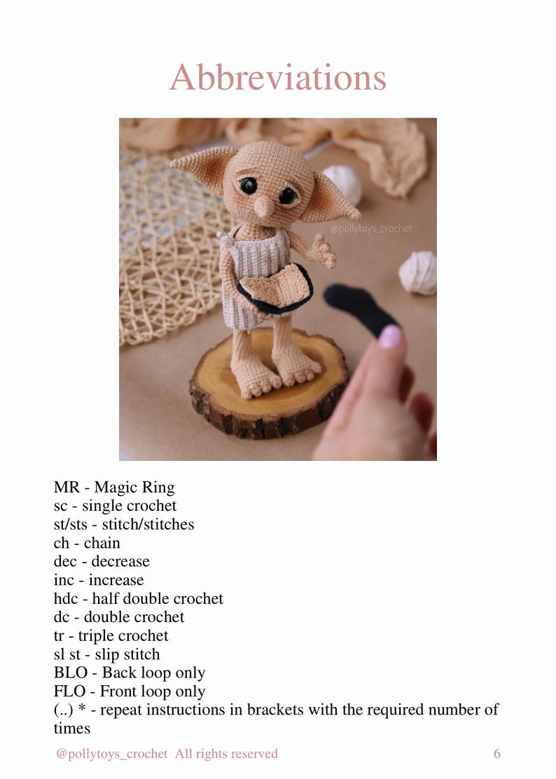 May include: A handmade crochet doll of a character with large ears, wearing a beige outfit, and holding a black object. The doll is displayed on a wooden slice. The image includes the text "Abbreviations".