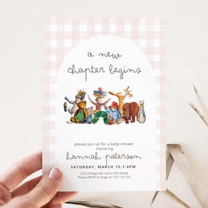 May include: A rectangular baby shower invitation card with a light pink gingham border and a white arched centre. It features watercolour illustrations of various storybook characters, the text 'a new chapter begins', and event details for Hannah Paterson.